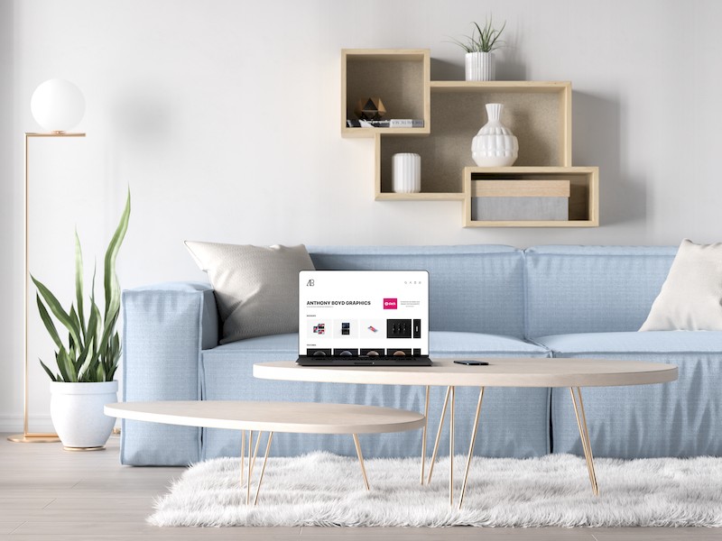 Bezel-Less MacBook Pro in Living Room Mockup.jpg