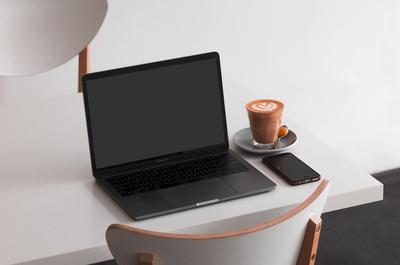 MacBook on Table Mockup-2.jpg