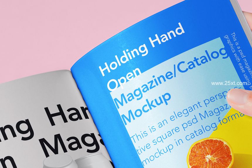 25xt-487471-Hand Holding Psd Magazine Mockup4.jpg