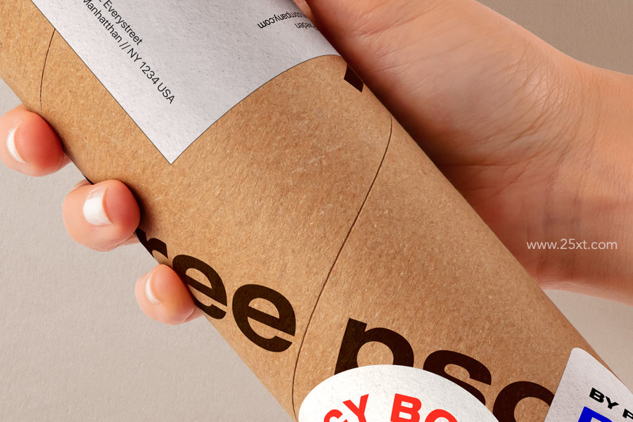 25xt-175144-Hand Holding Kraft Tube Psd Mockup4.jpg