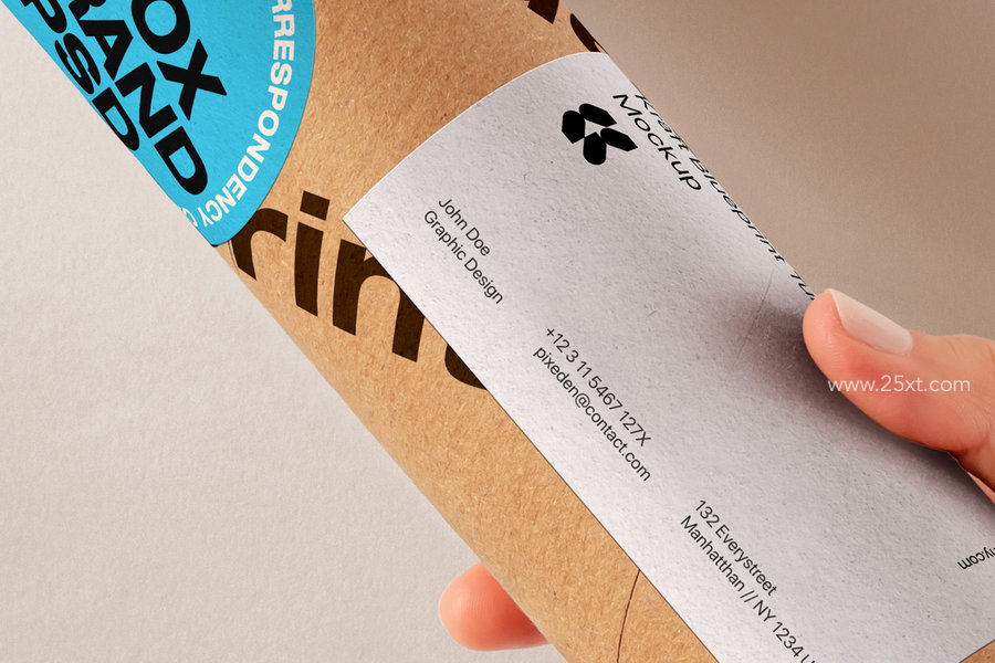 25xt-175144-Hand Holding Kraft Tube Psd Mockup3.jpg